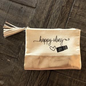 Happy Oiling Bag. Joy bottle pictured. Tassel at zipper. NWOT